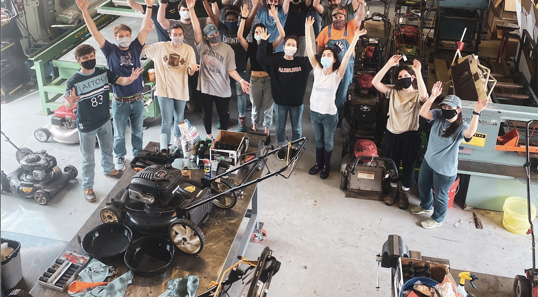 A group photo taken during last year's annual Lawnmower Clinic.