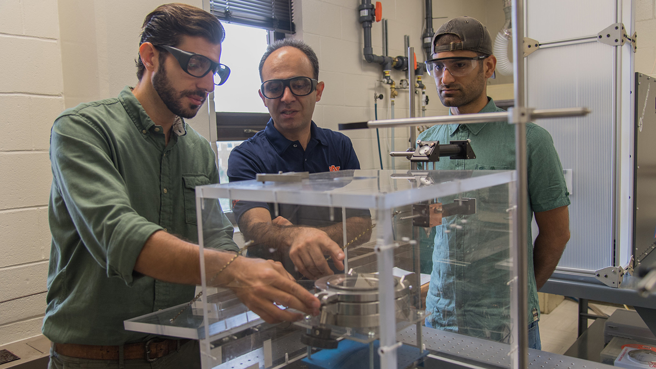 Researchers are pictured in assistant professor Masoud Mahjouri-Samani's Laser-Assisted Science and Engineering lab.