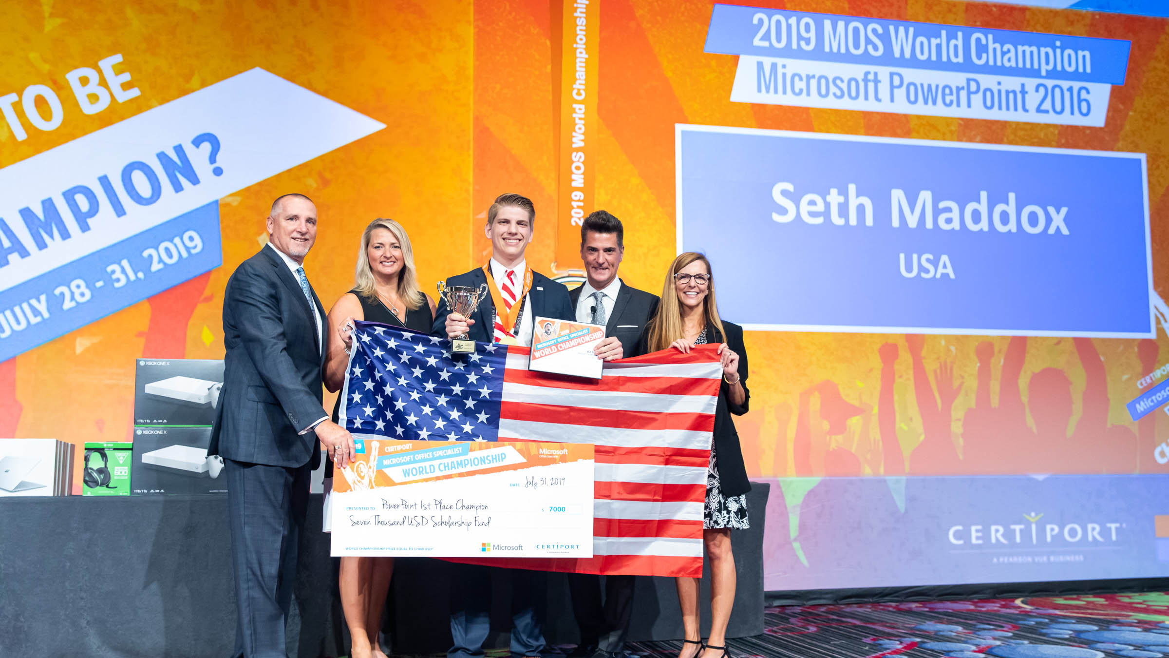 Incoming Auburn University freshman Seth Maddox was crowned the 2019 Microsoft Office Specialist PowerPoint World Champion on July 31 in New York. Pictured, from left, are Don Wagner and Nancy Jerdee with Pearson, Maddox, and Anthony Salcito and Jennifer Filarski with Microsoft.
