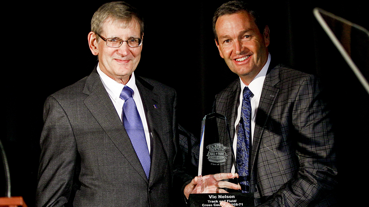 Vic Nelson (left) with University of Kentucky Athletics Director Mitch Barnhart.