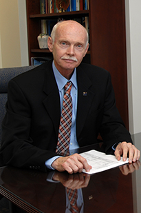 Dean Benefield at desk