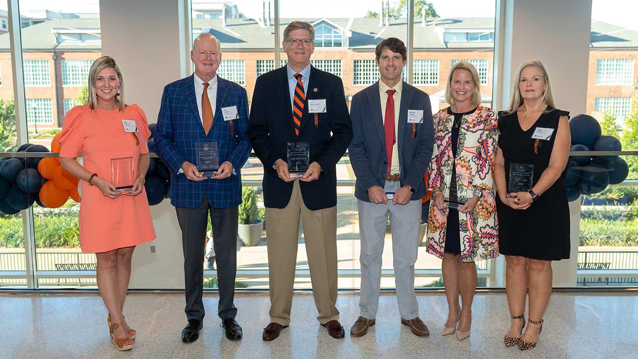 The 2022 Auburn Alumni Engineering Council award winners included Outstanding Young Auburn Engineer Kelly Roberts, ’05 and ‘07 civil engineering; Distinguished Auburn Engineer Jim Cooper, ’81 civil engineering; Distinguished Auburn Engineer John MacFarlane, ’72 mechanical engineering; Outstanding Young Auburn Engineer McClain Towery, ’03 civil engineering; Distinguished Auburn Engineer Nicole Faulk, ’96 mechanical engineering; and Superior Service Angie Lemke, retired, dean’s assistant. Not pictured is Distinguished Auburn Engineer TK Mattingly, '58 and '86 aerospace engineering.