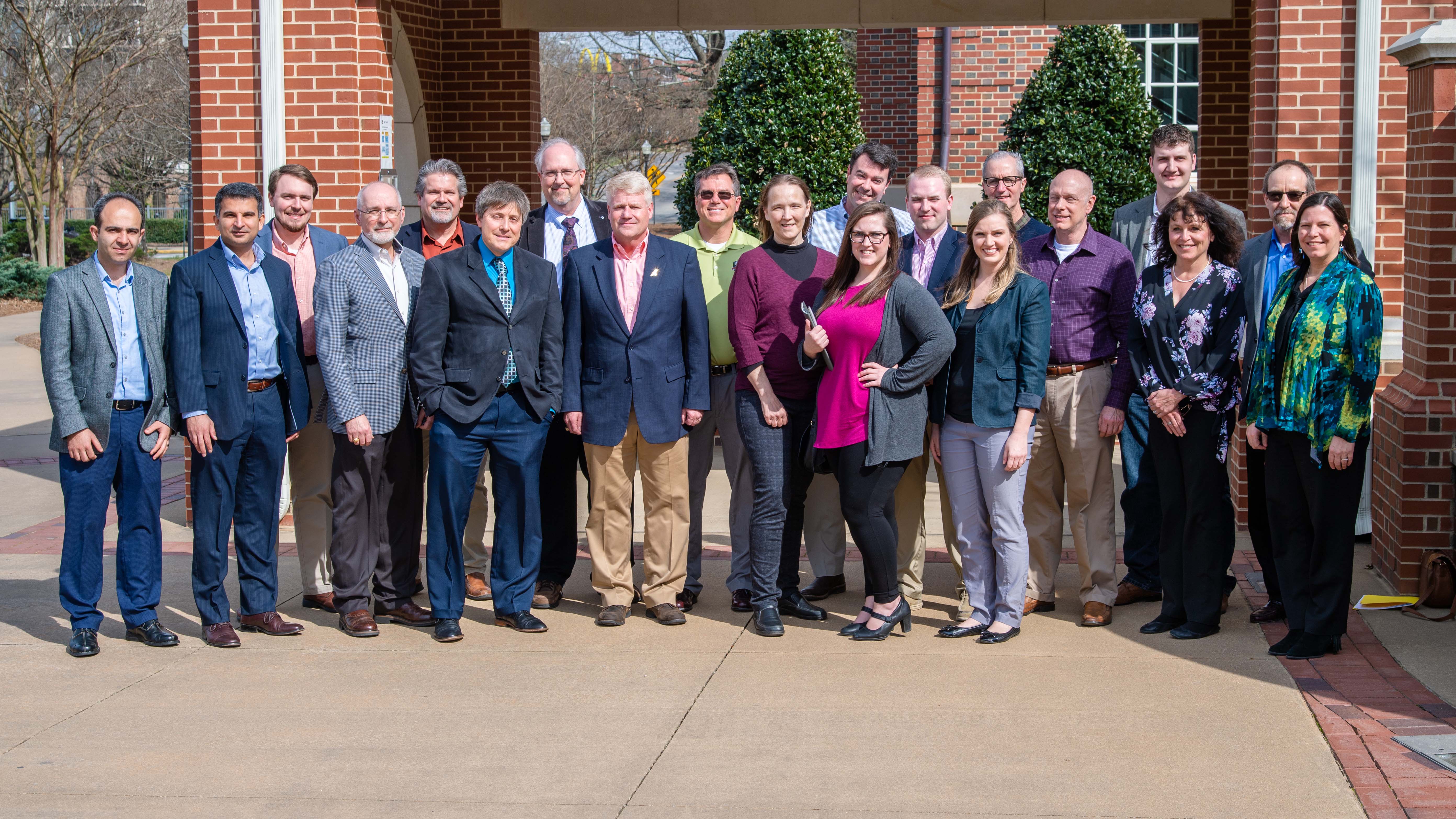Representatives from the Team Redstone Additive Manufacturing Integrated Product Team (IPT) pose with the staff of Auburn University’s National Center for Additive Manufacturing Excellence, or NCAME.