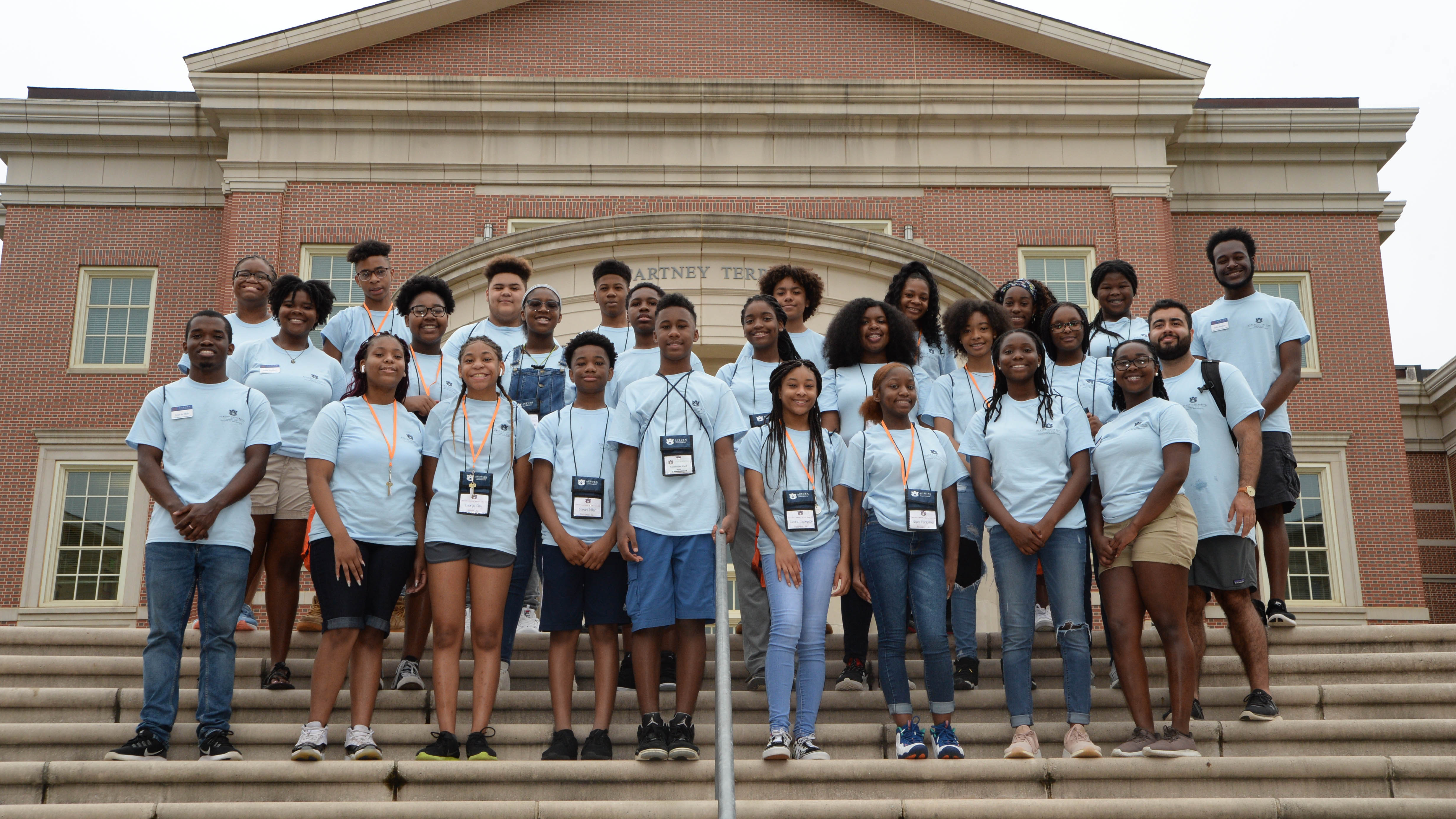Campers and counselors pose at the Tomorrow's Community Innovators camp.  