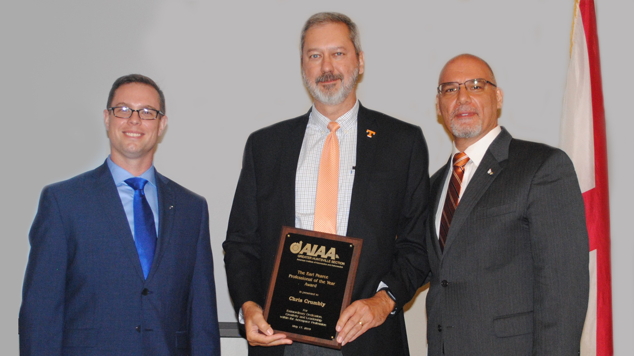 Chris Crumbly receives the 2019 Earl Pearce Professional of the Year Award sponsored by the Greater Huntsville Section of the AIAA.  LTR: Alex Jehle (Section Chair), Chris Crumbly, and Joe Majdalani (Honors and Awards Director)