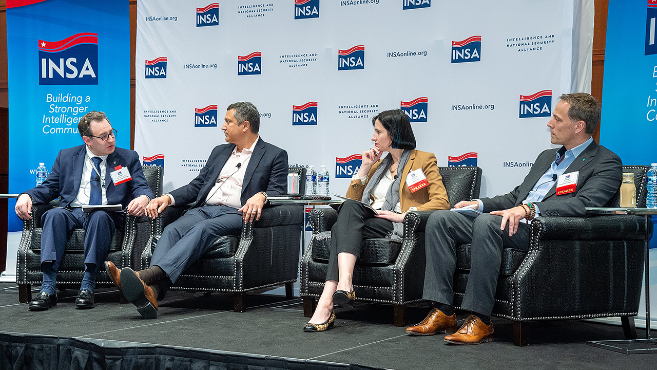 Daniel Tauritz (left) moderated a panel discussion on the “Use of AI for Cybersecurity."