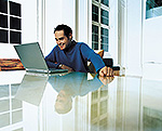 Man on Computer (color)