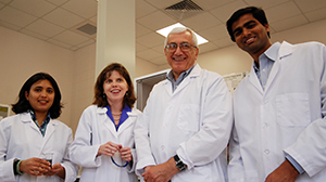 Faculty and students in lab
