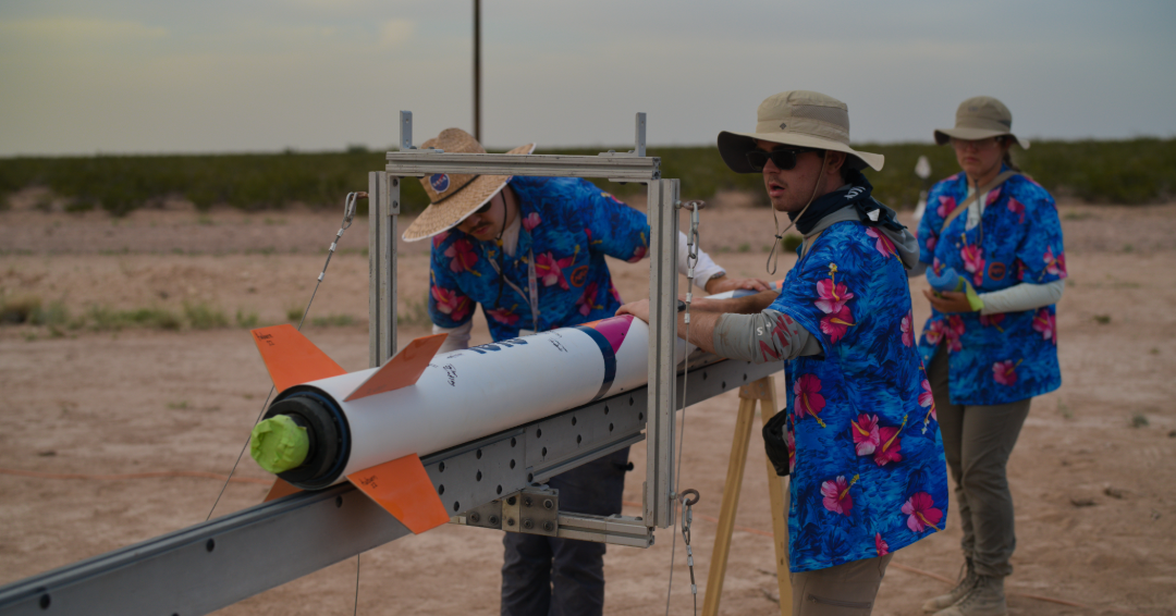 Students working on rocket.