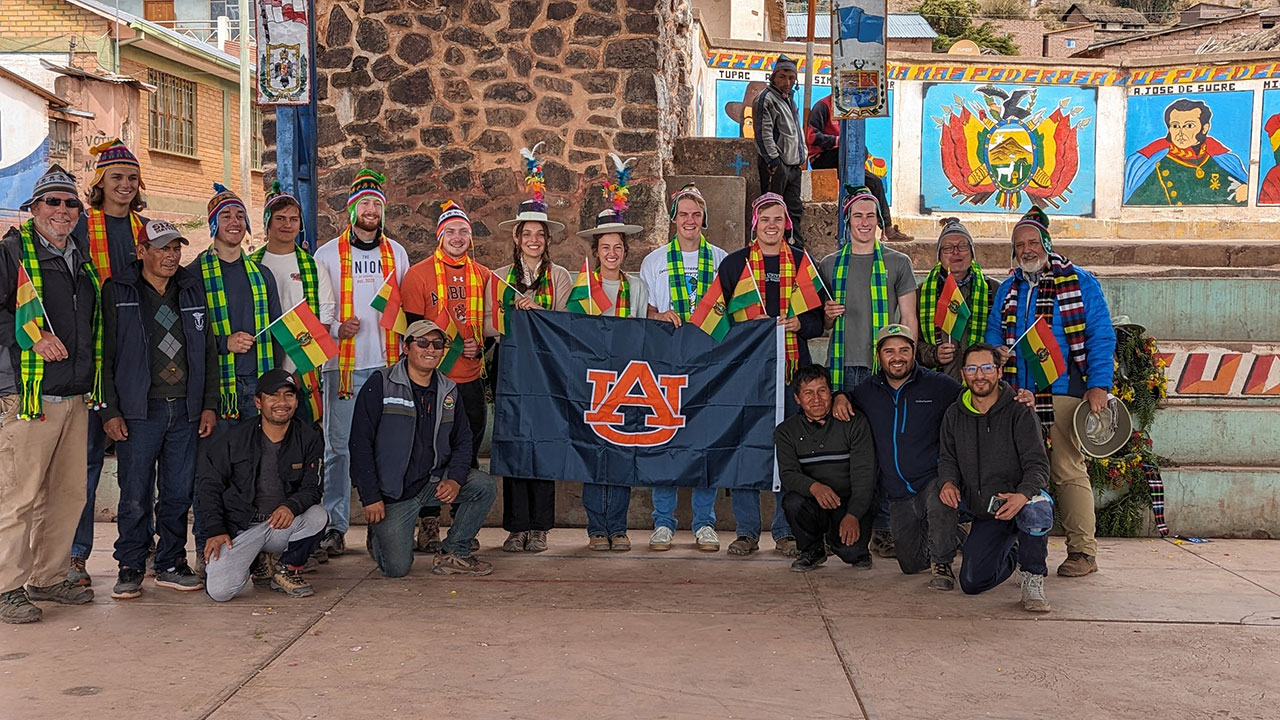 Taken on EWB’s final day this past summer in Quesimpuco, Bolivia. Team members were gifted scarves and hats by the community. Pictured, from left to right, Joseph Ragan, Sid Warren, Jack Patty, Caden Gort, Drew Johnston, Evan Wilson, Molly Smith, Ann Inskeep, Graham Kaplowitz, Oren Miller, Wilson Tynes, Steve Duke and Tom Corson. 