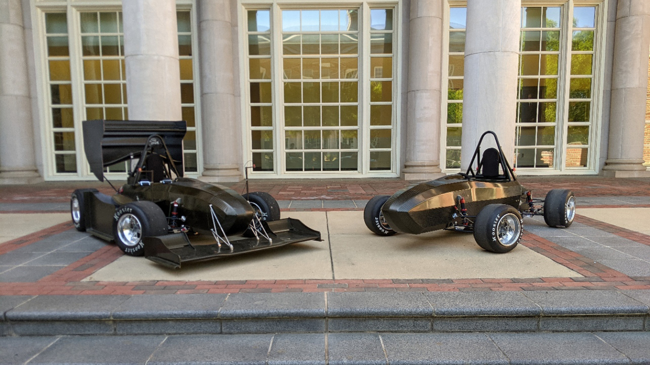 The Auburn Formula SAE Racing Team, War Eagle Motorsports, unveiled its hand-designed and manufactured 2021 competition race cars, combustion (left) and electric (right,) to sponsors, alumni and other Auburn affiliates Saturday, May 10.