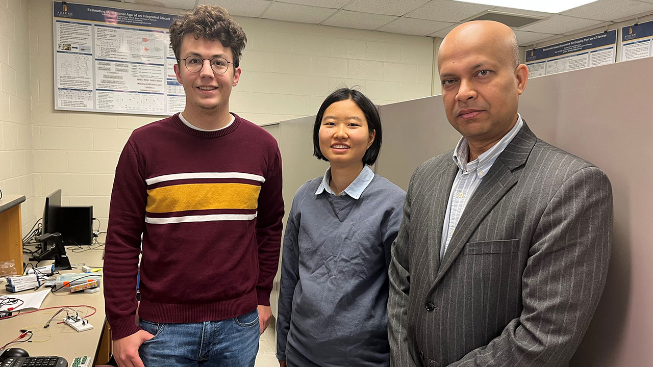 From left, graduate student Josh Hovanes, assistant professor in electrical and computer engineering Ujjwal Guin, and graduate student Yadi Zhong.
