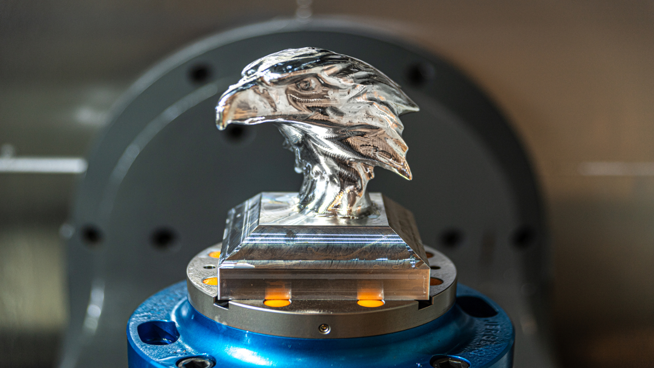 An eagle head sculpture was created in the ICAM’s five-axis mill machine. 