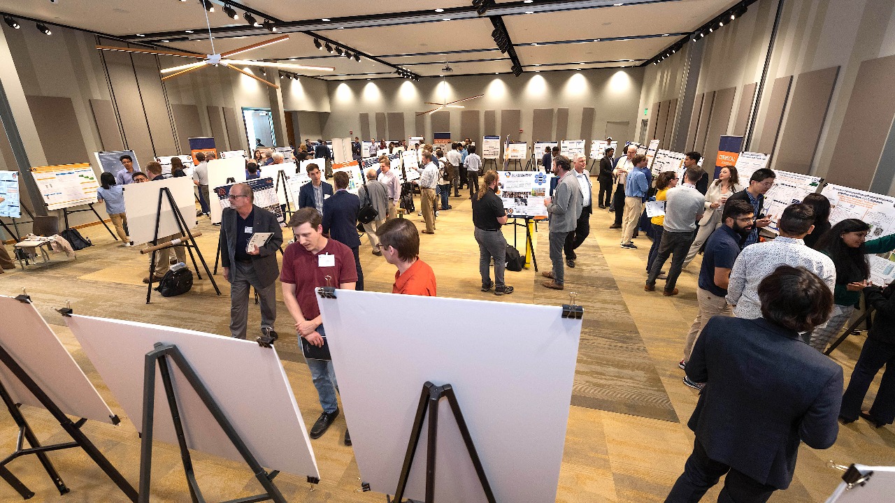 Graduate students and faculty from the Samuel Ginn College of Engineering present research posters at the second annual Graduate Engineering Research Showcase in Huntsville.