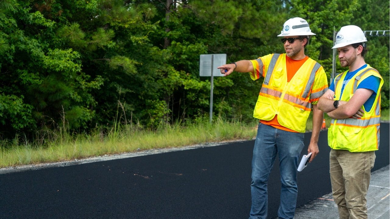 Benjamin Bowers, (left) associate professor in the department of civil and environmental engineering at Auburn University and graduate student Ben Prowell (right) during construction of the 9th Test Track cycle.