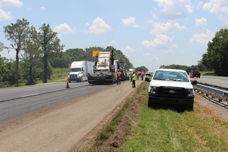 A Material Transfer Vehicle Provides Asphalt Mix to the Paver on I-75 near Lake City, Florida.