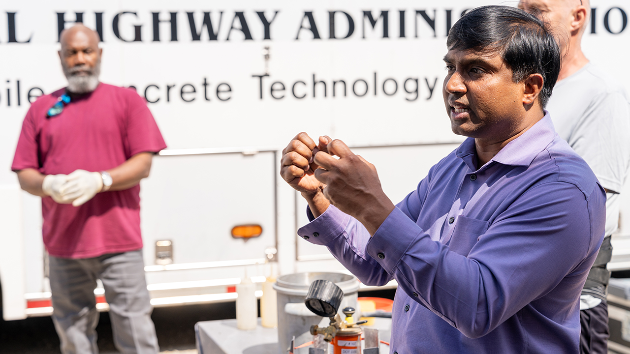 Auburn alumnus Jagan Gudimettla, ’02 civil and environmental engineering and project manager for the Federal Highway Administration’s Mobile Concrete Technology Center, leads a demonstration for students, faculty and industry professionals. 