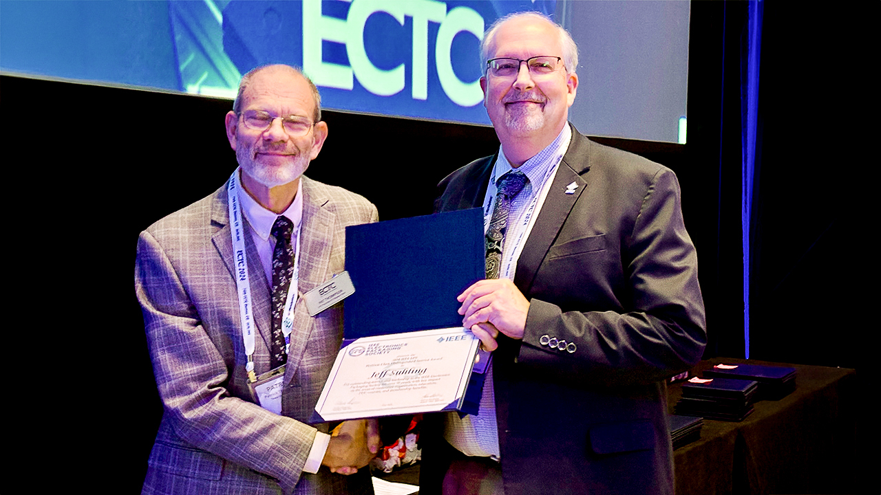 IEEE EPS President Patrick Thompson (left) presents Jeff Suhling, mechanical engineering department chair, with the William Chen Distinguished Service Award.