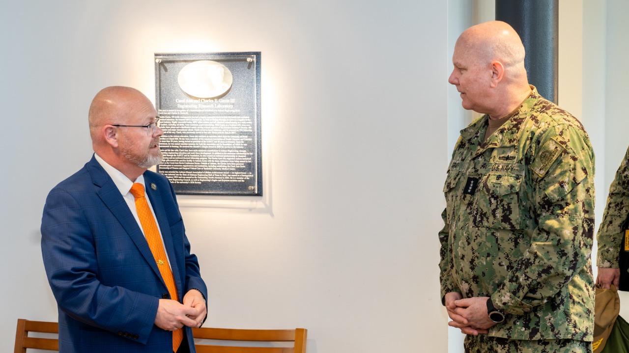 Dean Mario Eden (left) meets with Adm. Christopher W. Grady, Vice Chairman of the Joint Chiefs of Staff, during a tour of the National Center for Additive Manufacturing Excellence inside Auburn University's Gavin Engineering Research Lab.