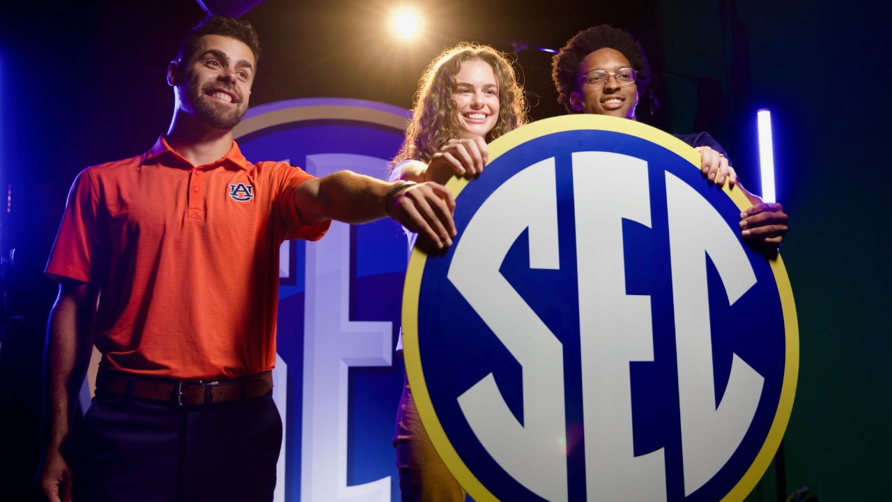 Mechanical engineering doctoral student David Hollinger (left) and mechanical engineering master's student David Edmondson (right), co-founders of The Digital Athlete, along with co-founder and Auburn MBA student Allison Tanner, on the set of SEC Start Up.  