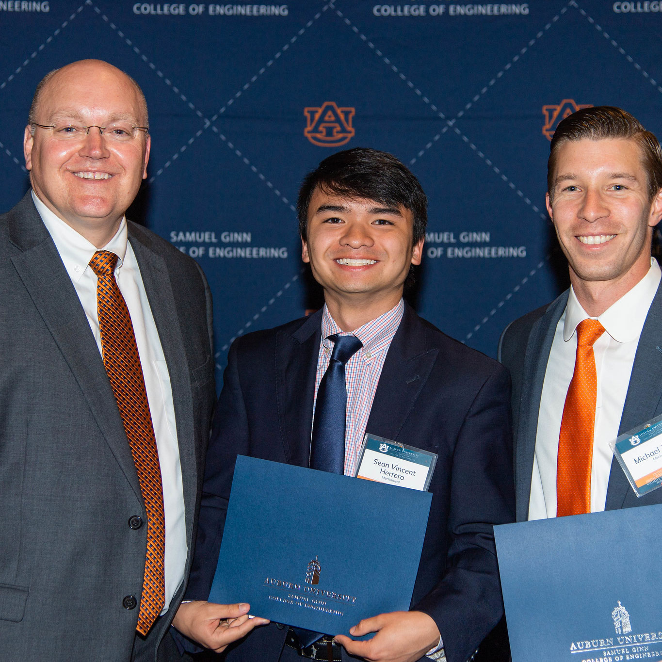 Sean Herrera, senior in mechanical engineering, and Michael Zabala, assistant professor of mechanical engineering, were the winners of the Mark A. Spencer Creative Mentorship Award. They are pictured with Dean Christopher B. Roberts.