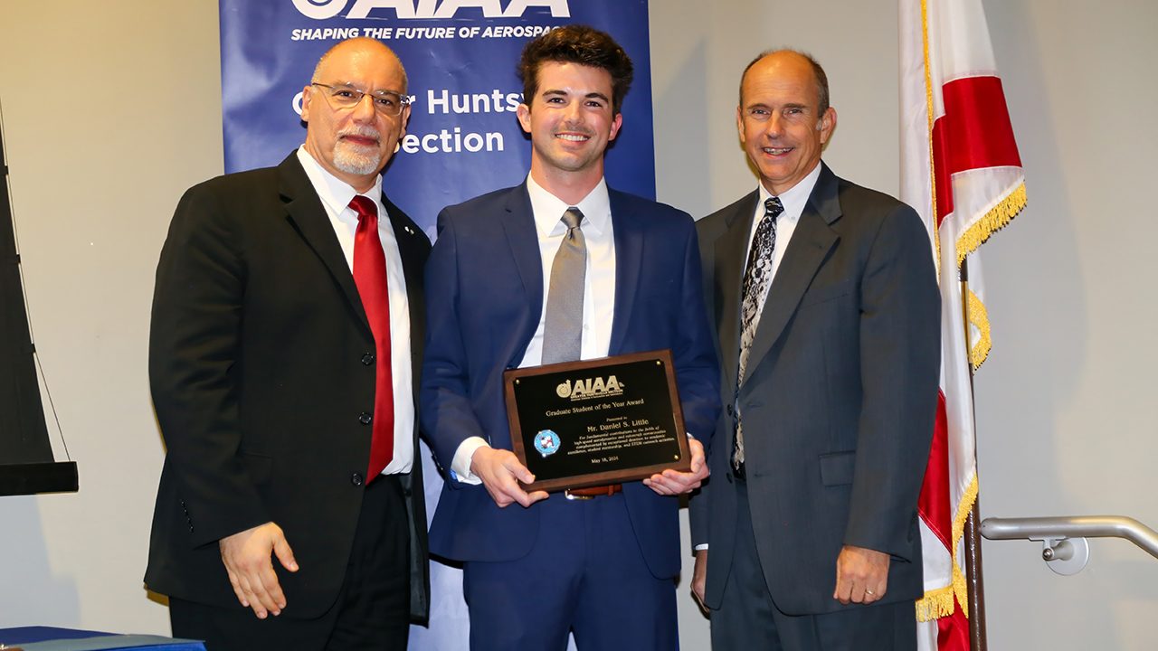 Daniel Little, a doctoral student in aerospace engineering, (middle) was named Graduate Student of the Year by AIAA Greater Huntsville Section. He stands next to Joe Majdalani (left), the Hugh and Loeda Francis Chair of Excellence in aerospace engineering at Auburn and Andrew Keys (right), Section vice chair.