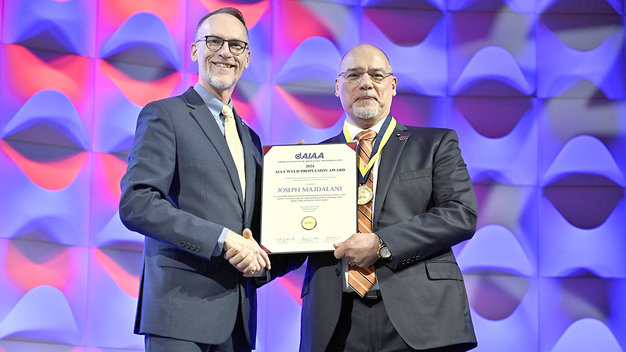 Joseph Majdalani receives the Wyld Propulsion medal and a citation certificate from Rusty Powell, AIAA Director for Propulsion and Energy, at the SciTech Forum on Jan. 10, 2024, in Orlando, Florida. 