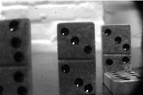 Baseline image of set of dominoes placed at varying distances from camera