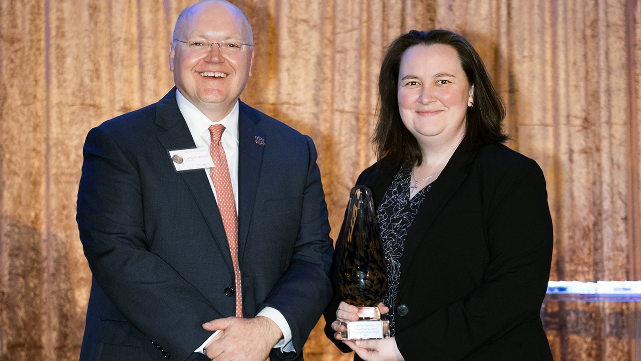 Erin Garcia, pictured with Auburn University President Chris Roberts, was honored with the Alumni Undergraduate Teaching Excellence Award at Auburn University’s 17th annual Faculty Awards ceremony on Thursday, Nov. 9.