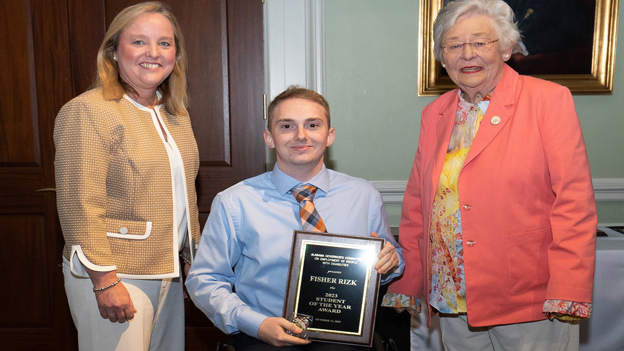 Govenor Kay Ivey presented Fisher Rizk with the Alabama Student of the Year award on Oct. 13 at a ceremony organized by the Alabama Department of Rehabilitation Services at the Department of Archives and History.