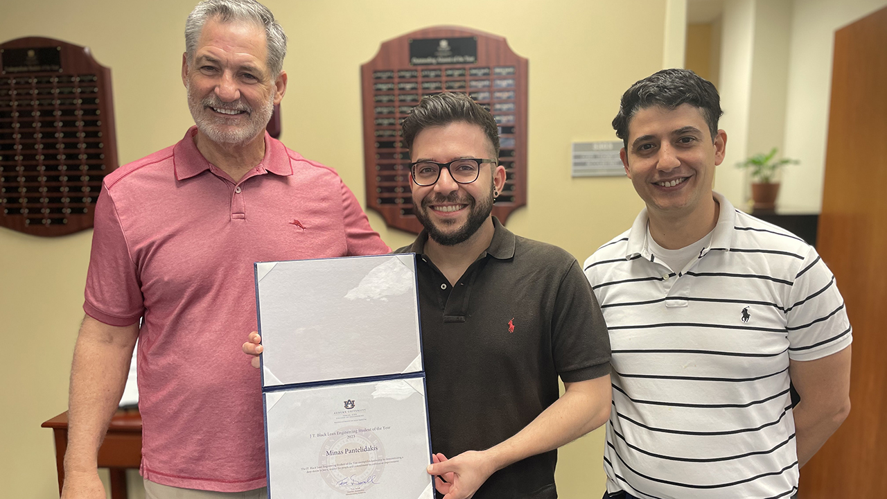 Minas Pantelidakis, pictured with ISE professors Tom Devall and Konstantinos Mykoniatis, a doctoral student in the Auburn University Department of Industrial and Systems Engineering, was recently named the 2023 JT Black Lean Engineering Student of the Year.
