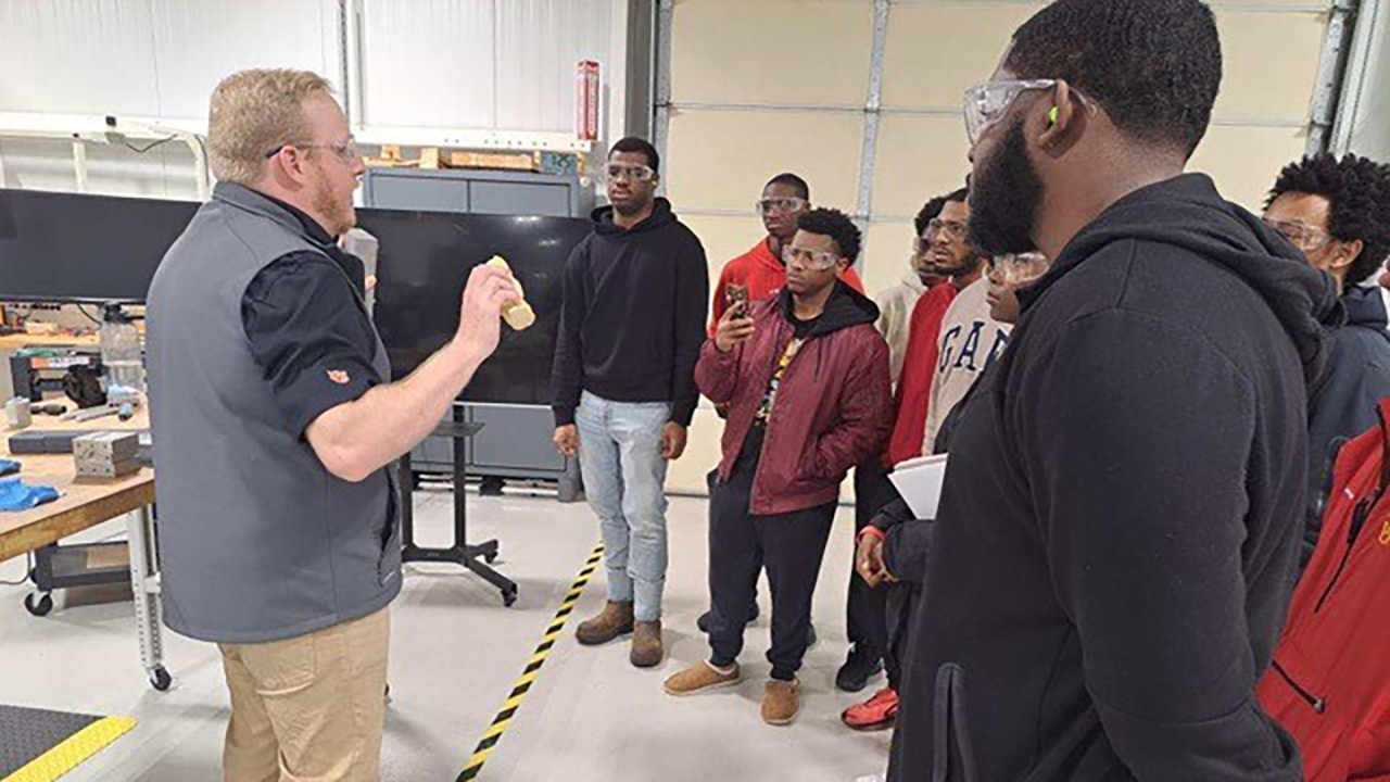 A cohort of Tuskegee students recently received hands-on manufacturing experience through a visit to the Auburn University Interdisciplinary Center for Advanced Manufacturing Systems (ICAMS).