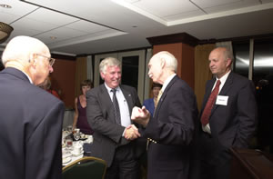 Kennedy Shaking Hands