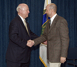Chris Roy receives handshake