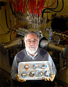 Roy Broughton with seven polymer samples