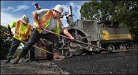 TNDOT Workers spreading asphault TNDOT Workers spreading asphault