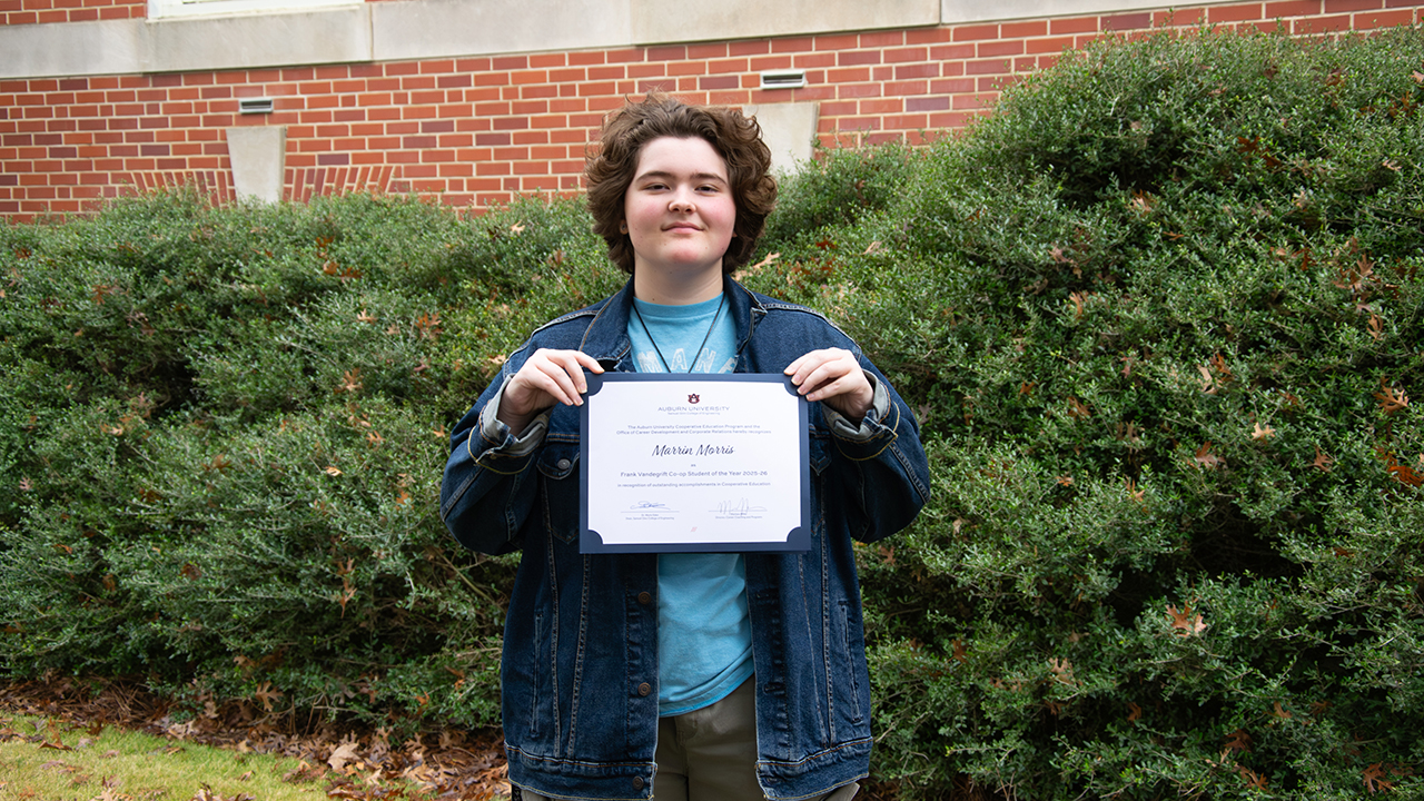 Marrin Morris, a junior in biosystems engineering, holds her certificate after being named Auburn Engineering’s Frank Vandegrift Co-op Student of the Year.