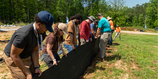 Participants attending a hands-on erosion and sediment control workshop
